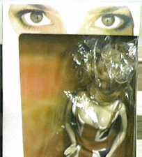 She's dead....wrapped in plastic!
